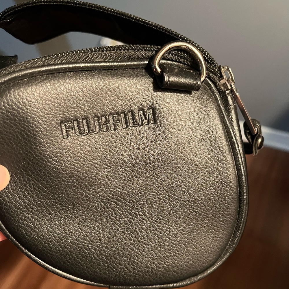 Fugi Film Camera Strap and Zip up carrying Bag (leather)
